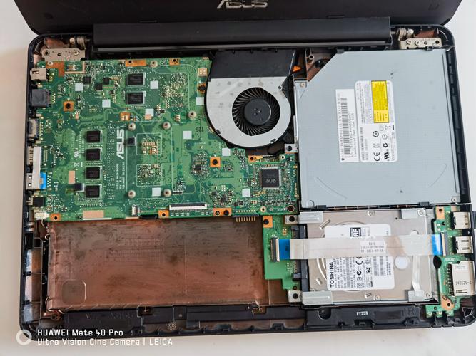 华硕笔记本电脑电池怎么拆