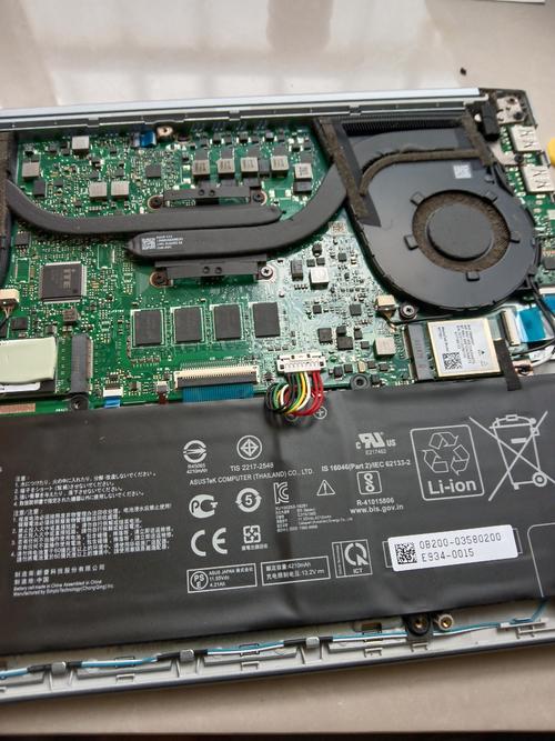 华硕笔记本电池怎么拆开