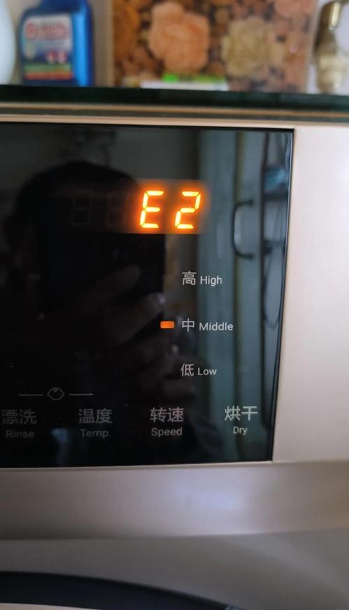 海尔洗衣机显示e1是什么故障